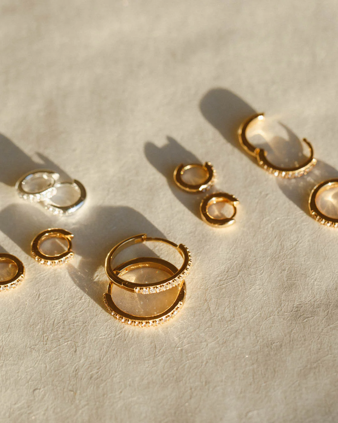 Ona White Sapphire Huggie Hoops - Image 3