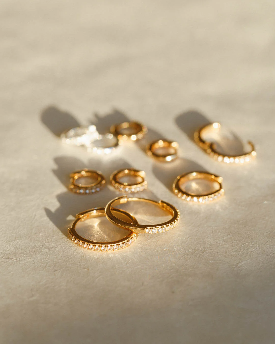 Ona White Sapphire Huggie Hoops - Image 6
