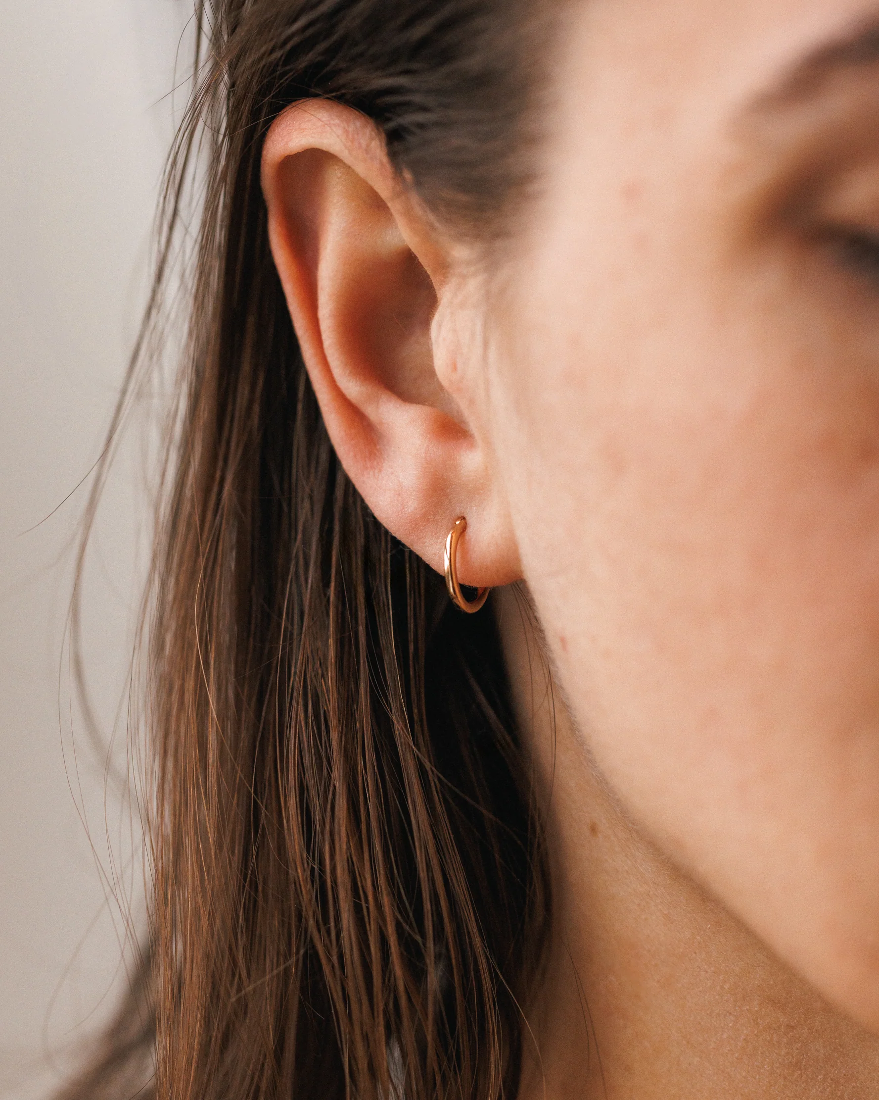 Solid Gold 24/7 Huggie Hoops - Image 2